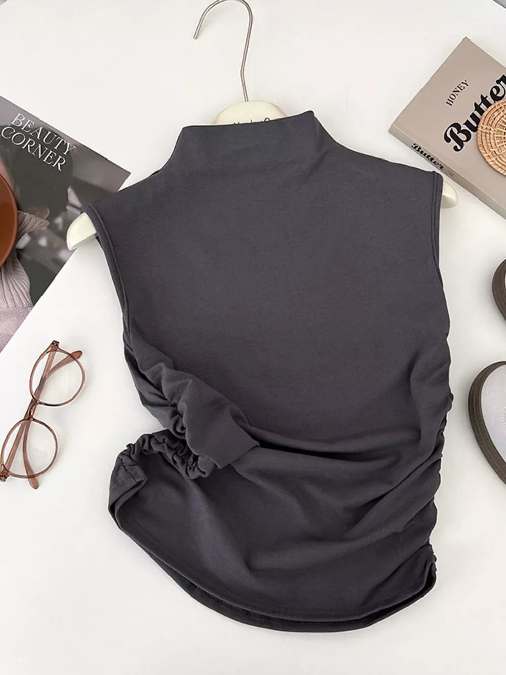 Dark gray ruched mock neck tank top with draped detail