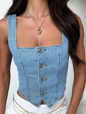 Denim corset tank top in medium blue with decorative buttons and a square neckline.