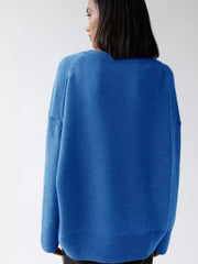 Light blue soft knit sweater with ribbed detailing and crew neck.