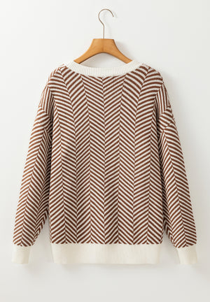 Chevron knit crewneck sweater in camel and white with a classic fit.