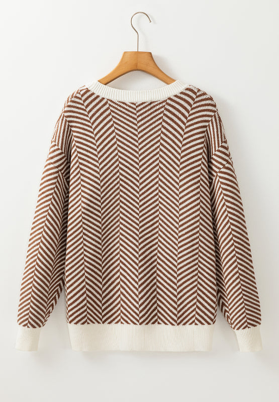 Chevron knit crewneck sweater in camel and white with a classic fit.