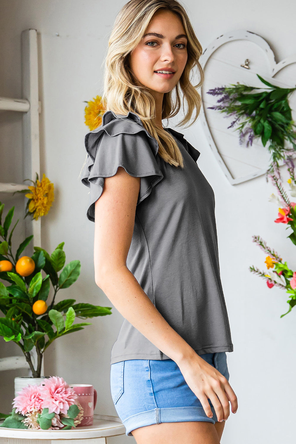 Mid Gray ruffled sleeve sculpted tee with a casual fit.