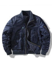 Navy zip-up bomber jacket with ruched sleeves and zippered pockets.