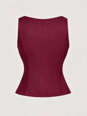 Burgundy tie-shoulder vest with button front and flared hem.