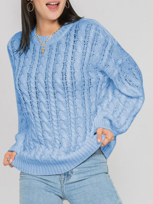 Sky blue acrylic cable knit openwork sweater with crew neck and long sleeves.