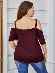 Burgundy cold shoulder v-neck top with elbow-length sleeves.