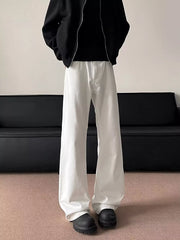 Essential oversized wide-leg sweatpants in white, featuring a relaxed fit and casual drape.