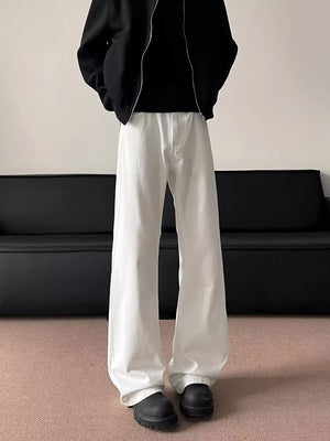 Essential oversized wide-leg sweatpants in white, featuring a relaxed fit and casual drape.