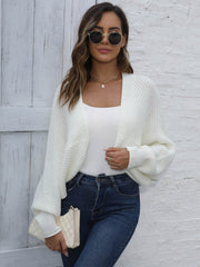 Women's white acrylic batwing sleeve knit cardigan with a relaxed fit.