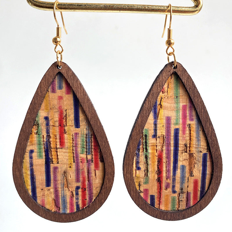 Cork & stripe teardrop statement earrings with colorful vertical lines and gold hooks.