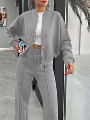 Gray bomber jacket and wide-leg tracksuit with contrast stitching