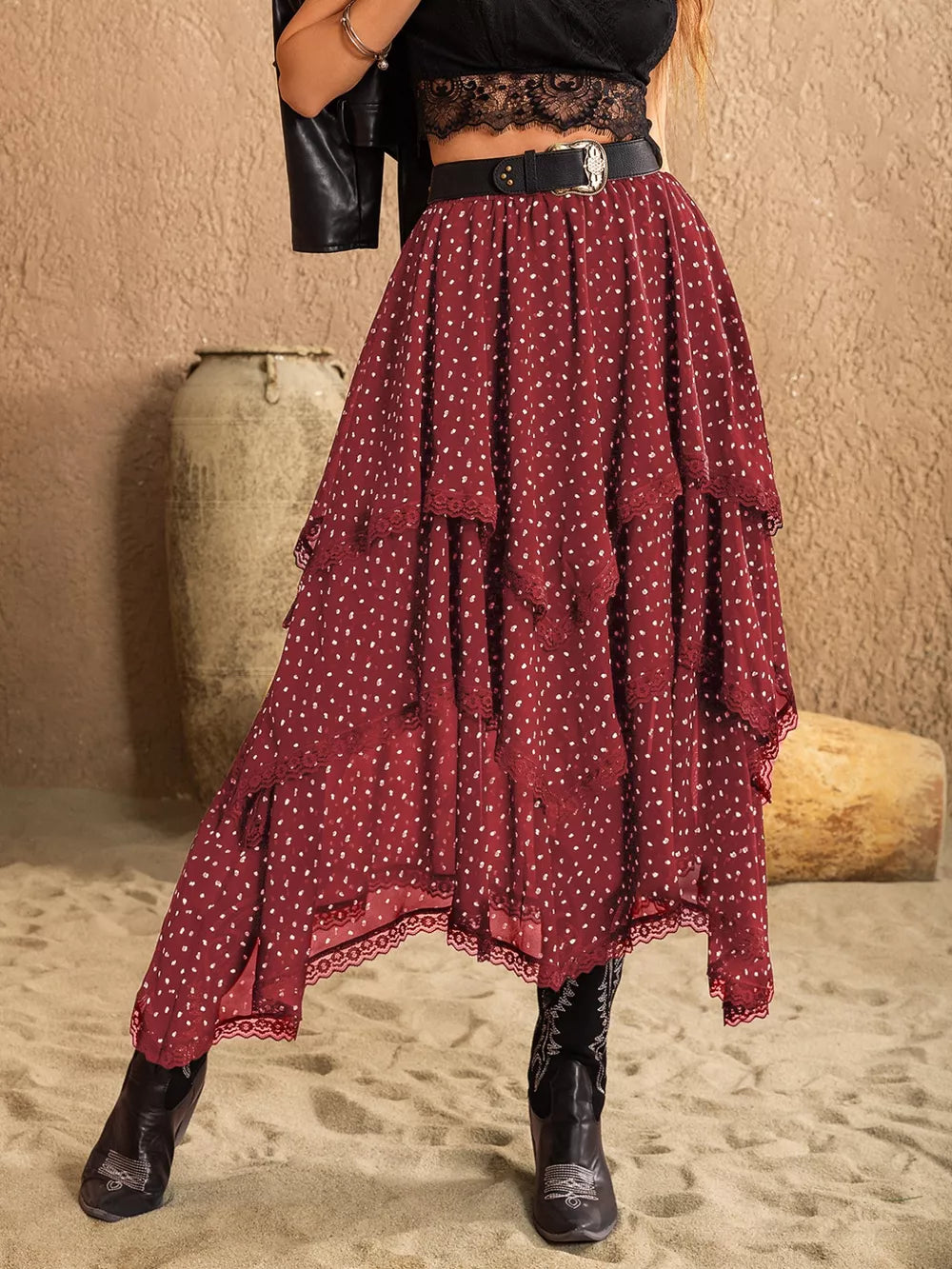 Burgundy tiered midi skirt with white polka dots and lace trim.