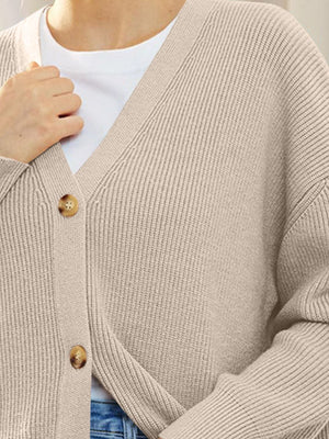 Dust Storm ribbed knit cardigan with balloon sleeves and button front.