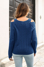 Dark blue cable knit acrylic sweater with cold shoulder detail and V-neckline.