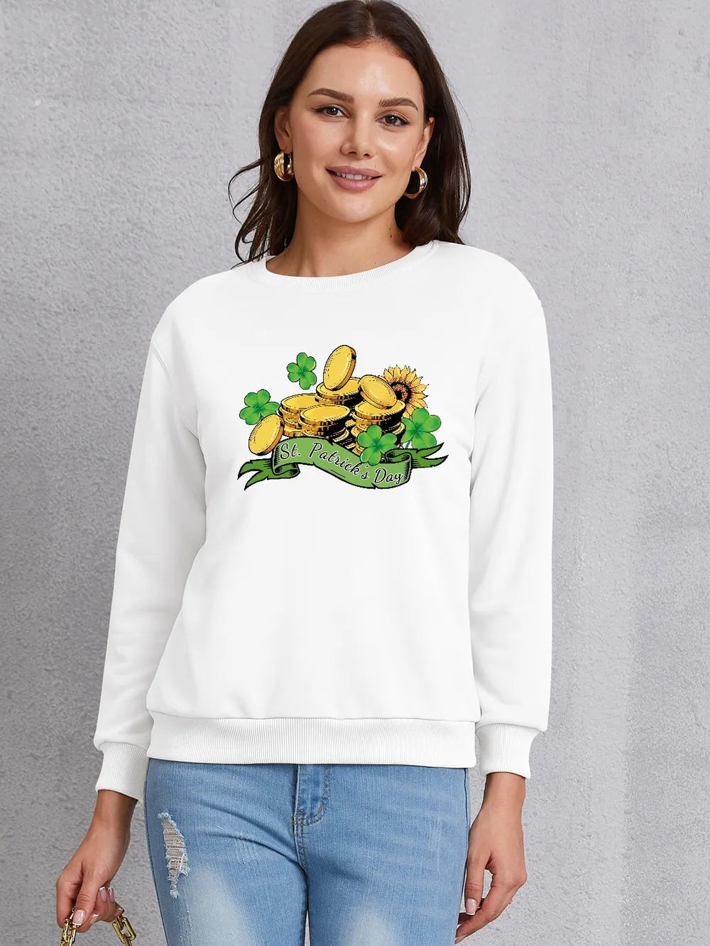 White St. Patrick's Day graphic sweatshirt with shamrocks, gold coins, and a banner.