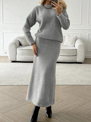 Gray textured knit co-ord set with relaxed fit sweater and maxi skirt.