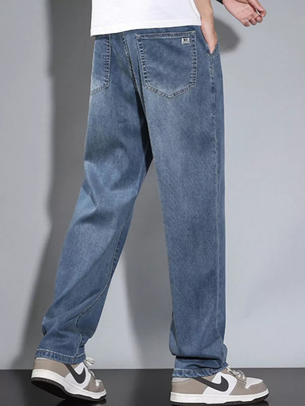 Men's Loose Fit Washed Jeans in Dark Gray, back view