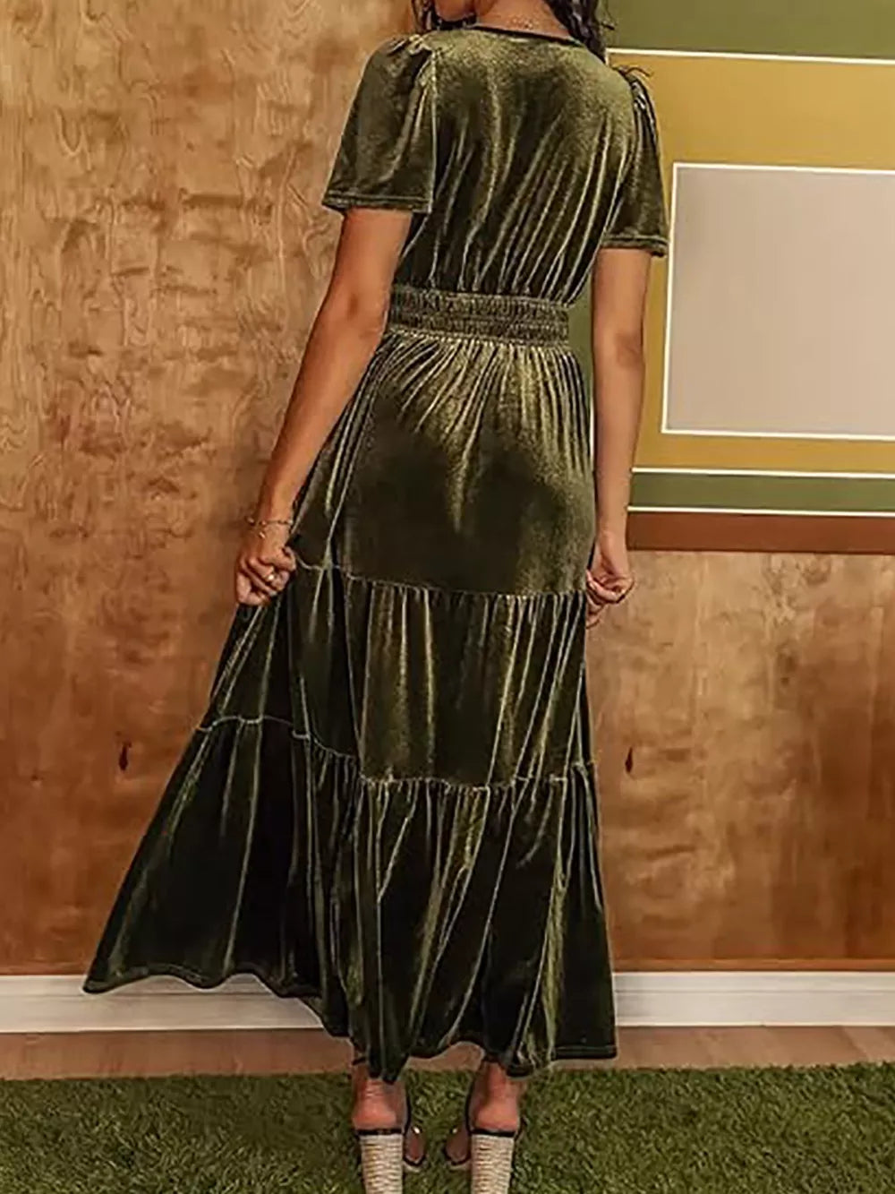 Army green velvet maxi dress with short sleeves, ruched bodice, elastic waist, and tiered skirt.