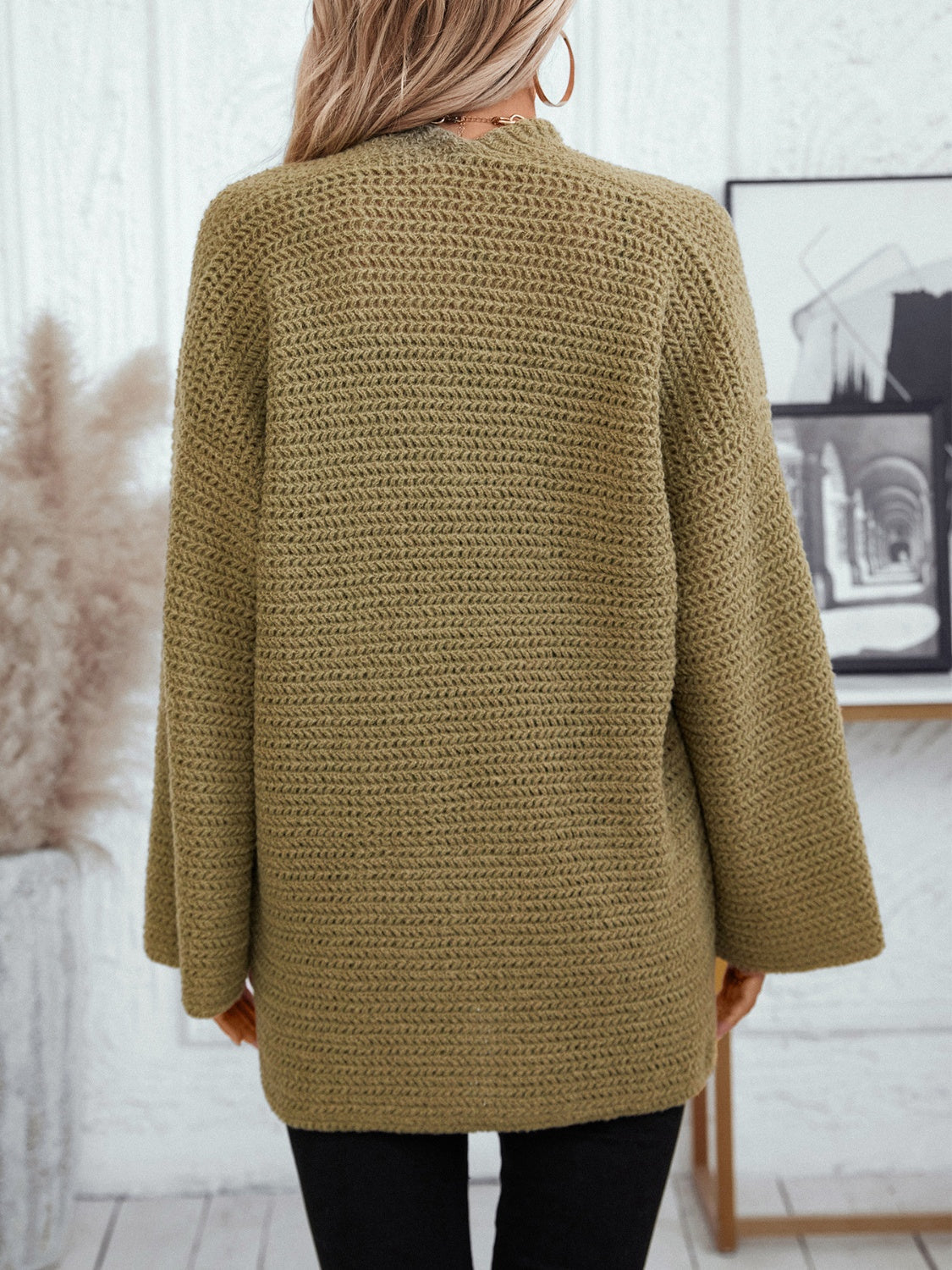 Chunky knit open front cardigan in moss with wide sleeves.