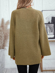Chunky knit open front cardigan in moss with wide sleeves.