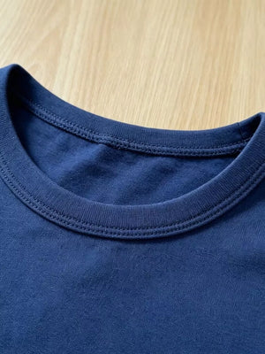 Navy blue cotton tee with double-stitched crew neck detail