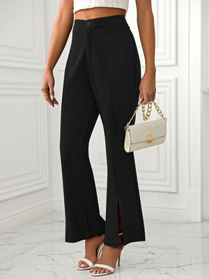 Black tailored flare trousers with split hems and a high waist.