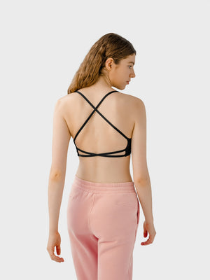 Black active crop top with strappy back detail