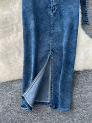Blue denim maxi skirt with high slit and visible stitching detail