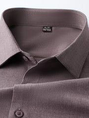 Men's brown long sleeve button-down shirt, close-up of collar and buttons.
