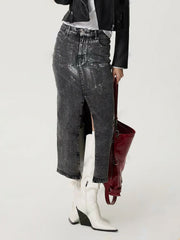 Black distressed denim maxi skirt with high slit and buttoned waist.