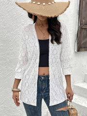 White floral lace open-front duster with pom-pom trim and 3/4 sleeves.