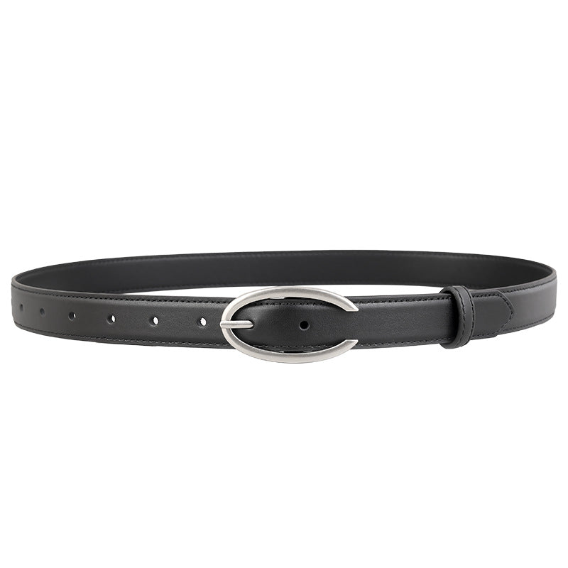 Black leather belt with a contemporary oval silver buckle and multiple holes.
