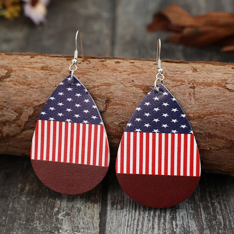 Patriotic faux leather teardrop earrings with American flag design in deep red.
