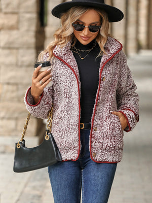 Burgundy sherpa jacket with crimson piping, button front, and pockets.