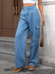 Blue high-waisted denim cargo pants with multiple pockets and a relaxed fit.
