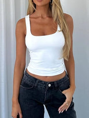 White square neck tank top with a fitted cut, styled with dark wash jeans.