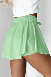 Flared skort in Gum Leaf with elastic waist and tie detail, A-line cut.