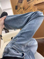 Men's relaxed fit light blue denim jeans with pockets, made of 100% cotton.