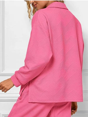 Rose Red V-neck textured lounge set with diagonal pattern.