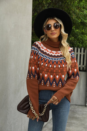 Geometric knit turtleneck sweater in caramel with orange, white, and navy pattern