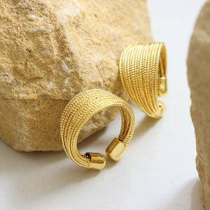 Gold textured coil open-ended ring with boho style