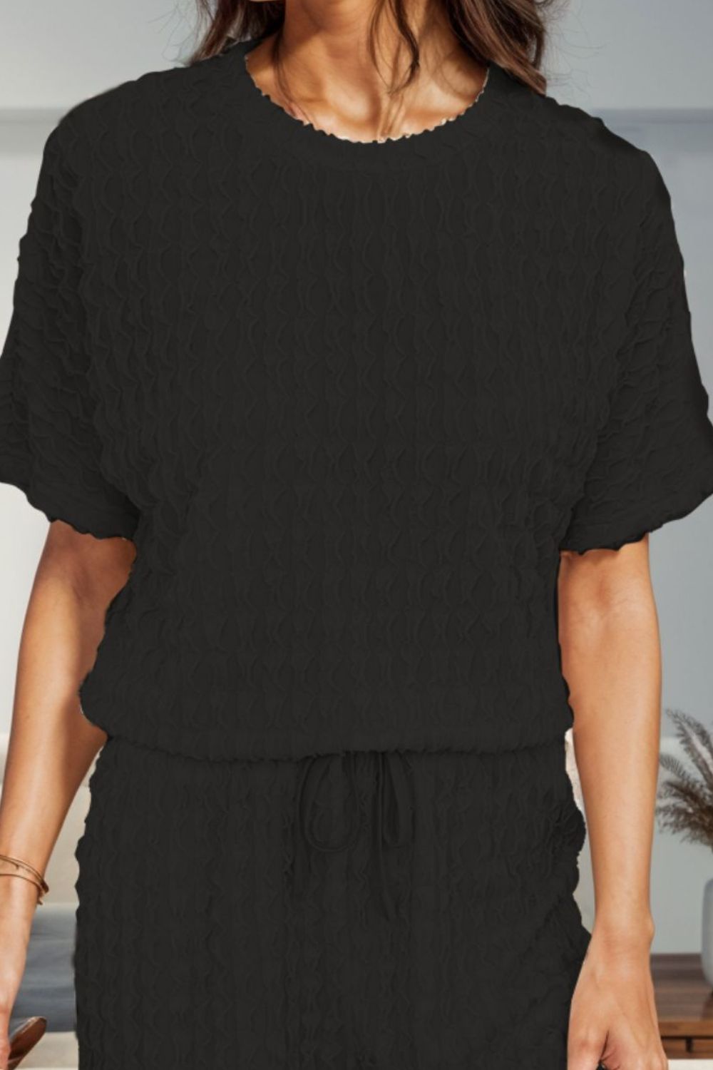 Black textured bouclé tee with drawstring shorts set.