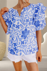 Blue floral print blouse with ruffled sleeves and v-neck