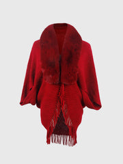 Deep Red textured knit poncho with faux fur collar and fringe detail