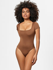 Brown short sleeve bodysuit with square neckline and high cut leg