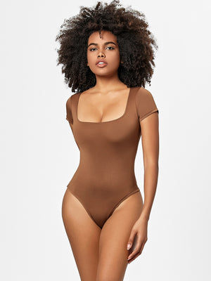 Brown short sleeve bodysuit with square neckline and high cut leg