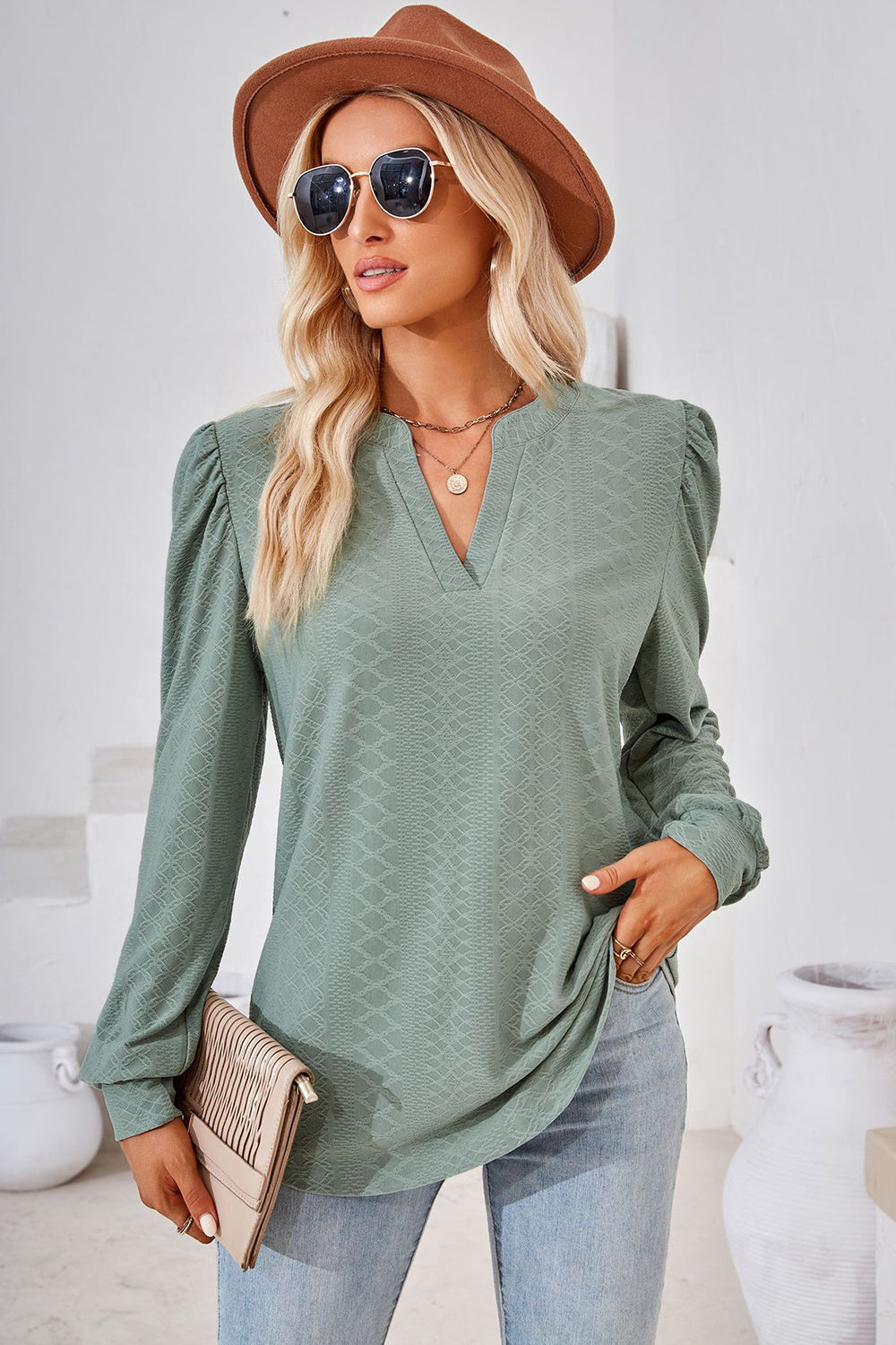 Sage textured puff sleeve henley blouse with v-neck and gathered shoulders