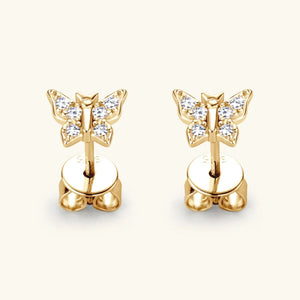 Gold moissanite butterfly stud earrings with clear stones.
