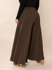 Dark brown sculpted flare palazzo trousers with a wide leg cut.