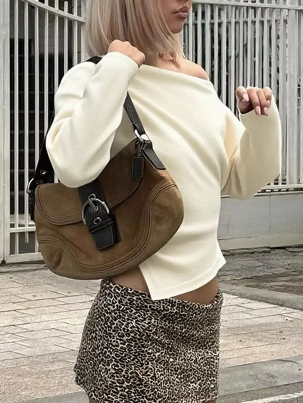 Apricot draped asymmetrical off-shoulder t-shirt with long sleeves and a relaxed fit.